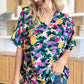 Double Take Full Size Printed V-Neck Short Sleeve Side Slit Top